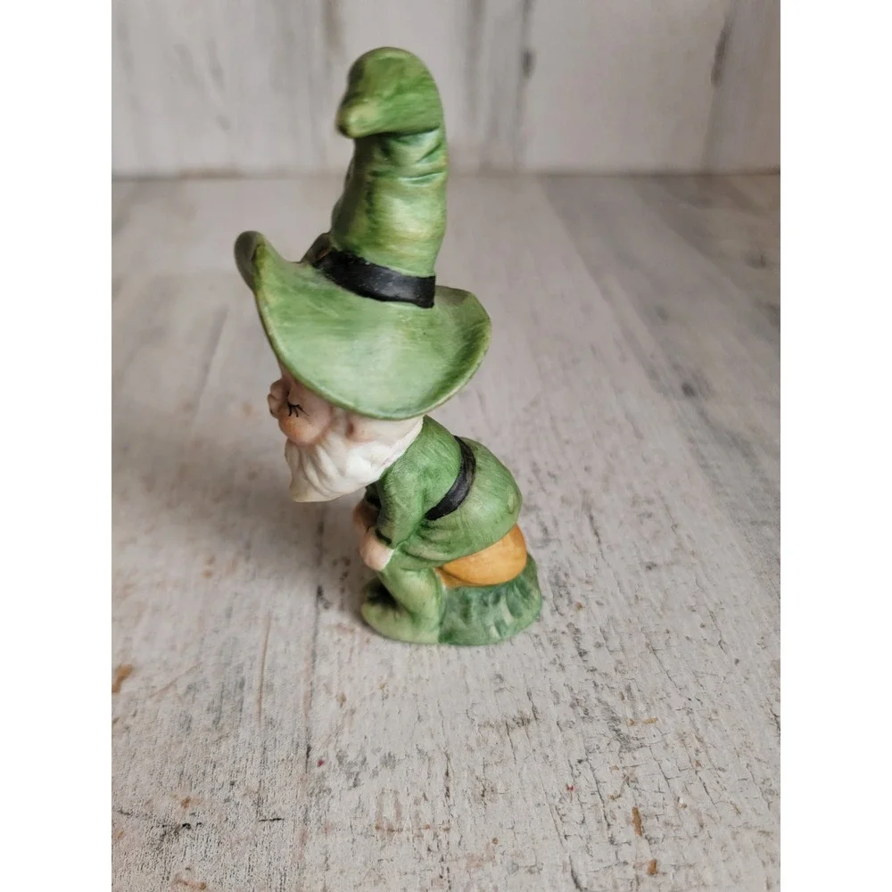 Vintage sitting kissing elf Santa helper gnome porcelain Xmas figure home decor